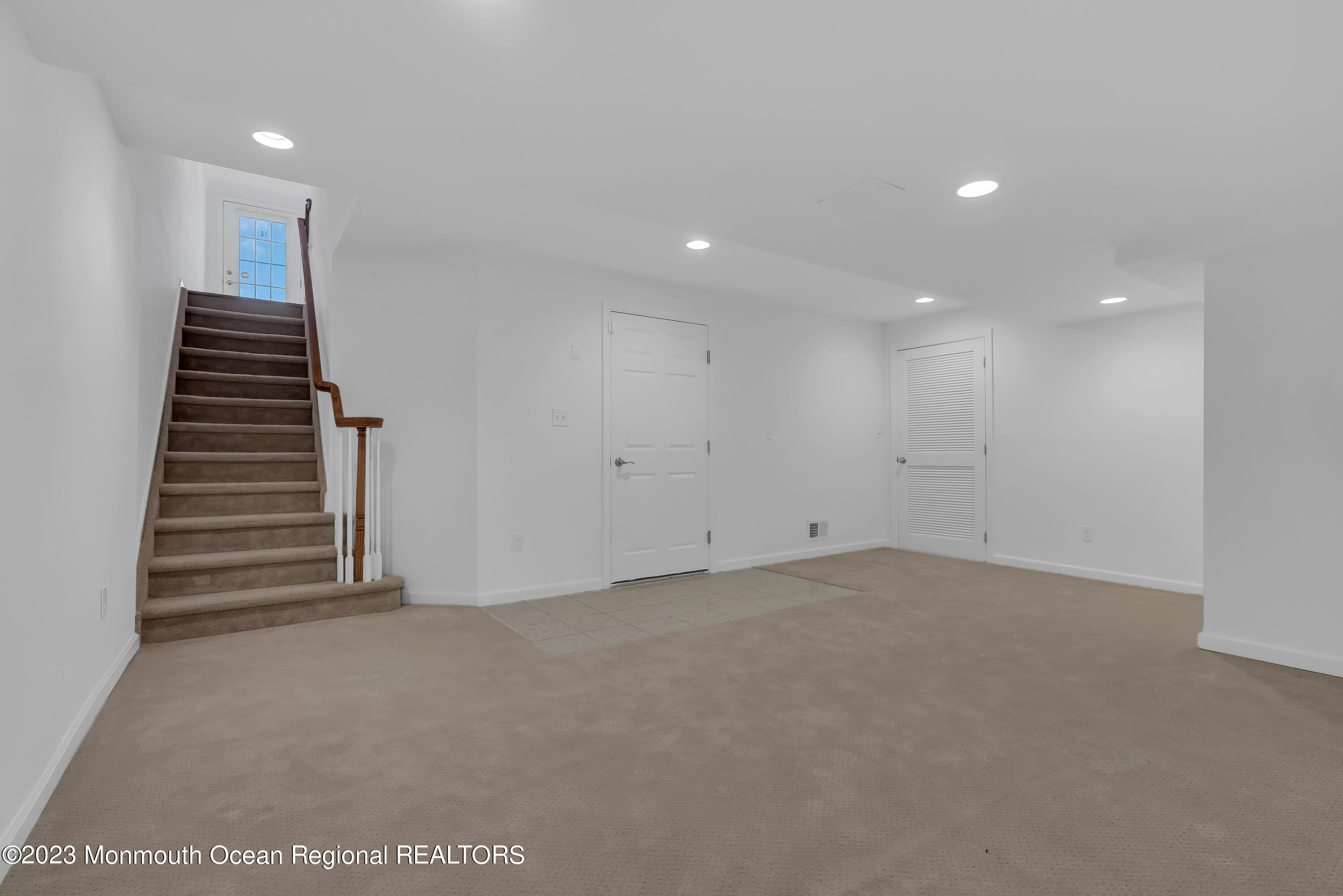 16 Mariners Bend Brielle, NJ 08730 - Photo 47 of 66 a view of an empty room with stairs