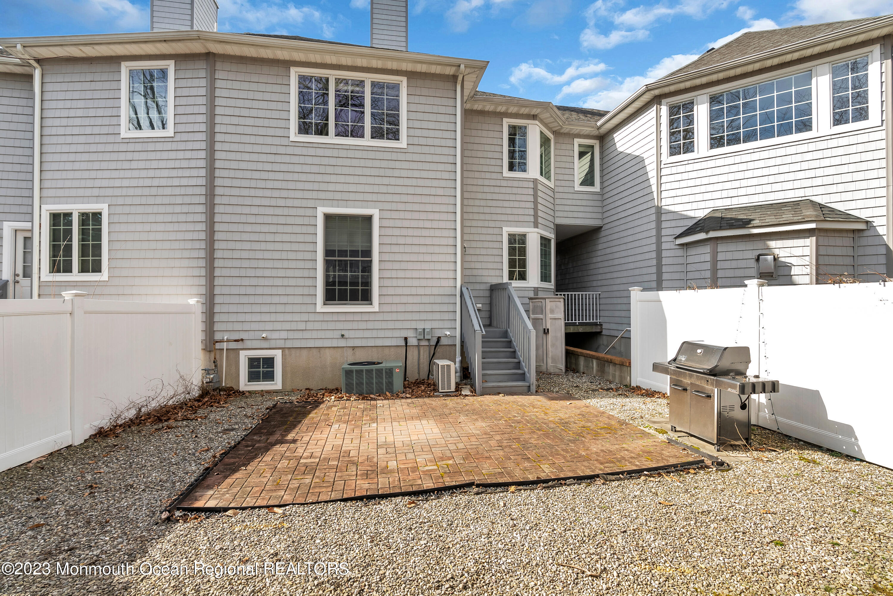 16 Mariners Bend Brielle, NJ 08730 - Photo 50 of 66 a house view with a outdoor space