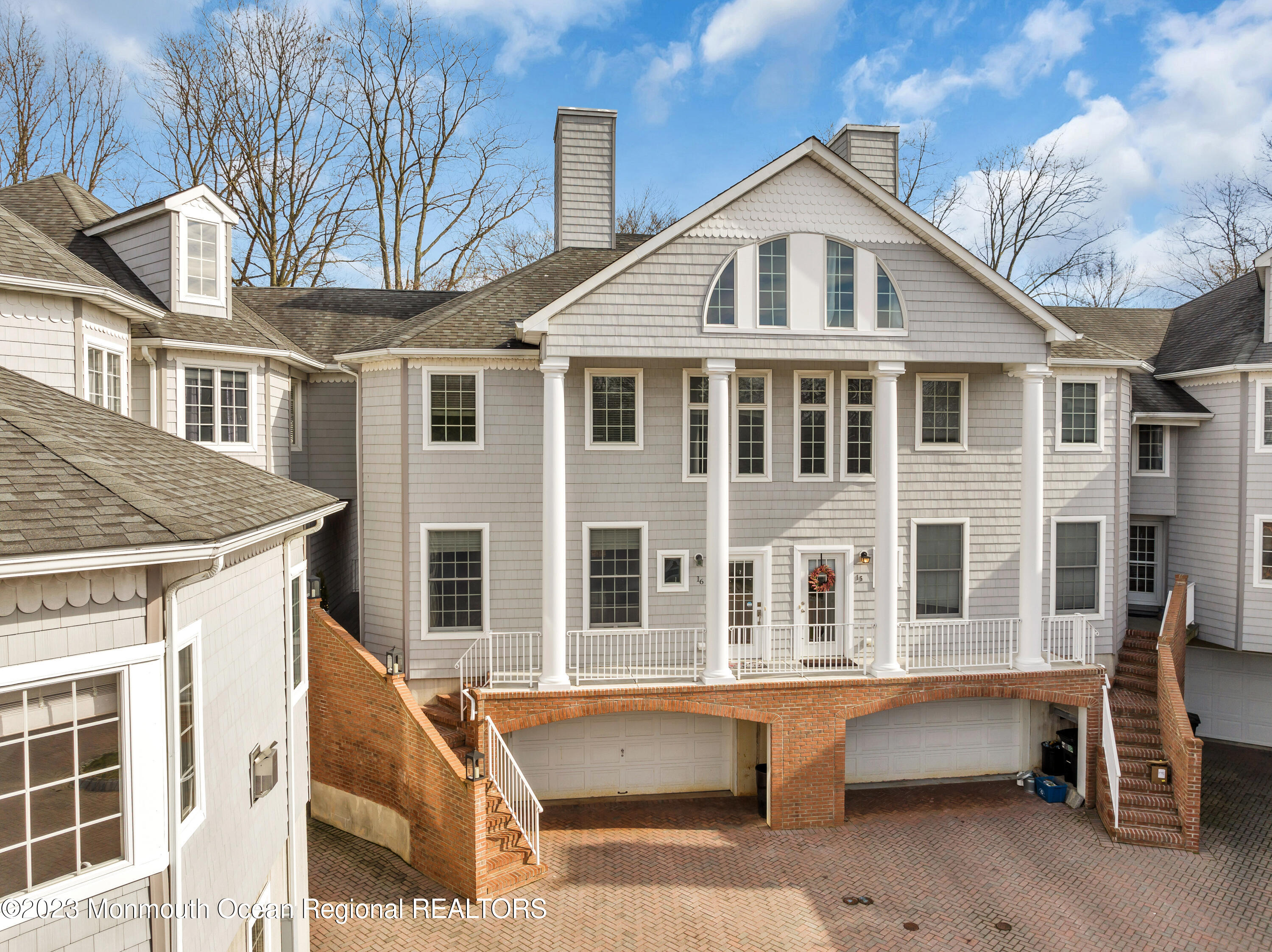 16 Mariners Bend Brielle, NJ 08730 - Photo 56 of 66 a front view of a house with a yard