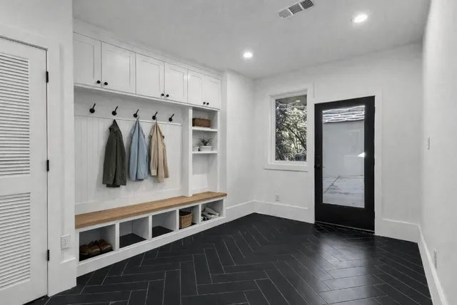 a view of a park with large trees