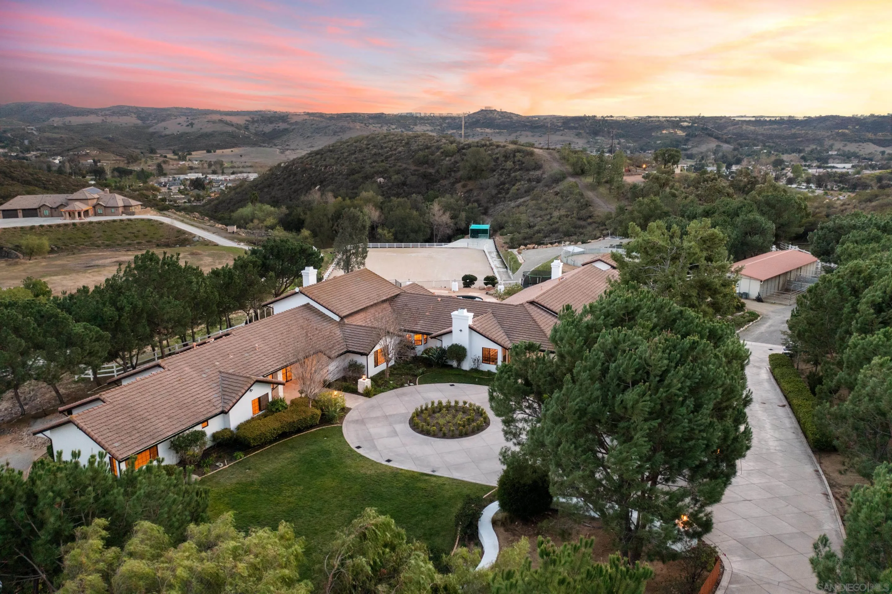 an aerial view of a house with outdoor space