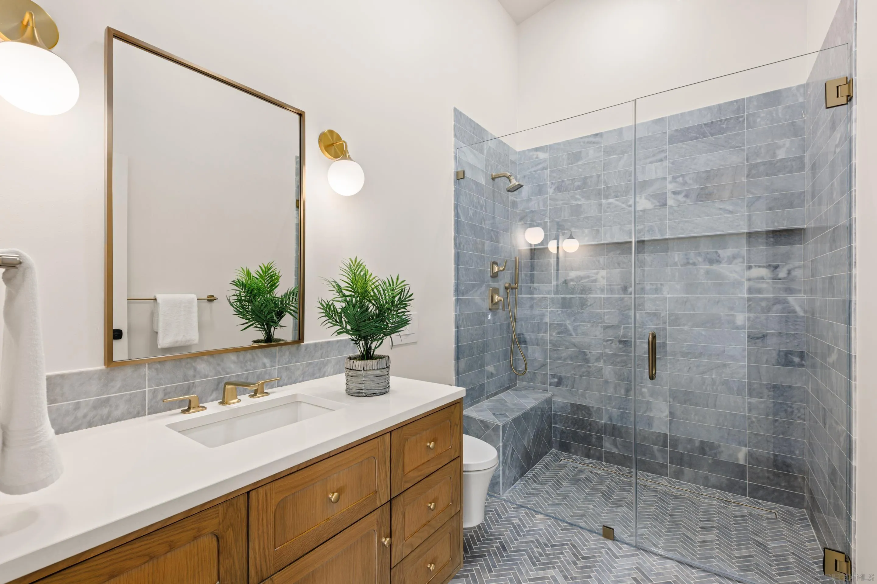 13807 Millards Ranch Lane Poway, CA 92064 - Photo 26 of 36 a bathroom with a granite countertop shower sink and mirror