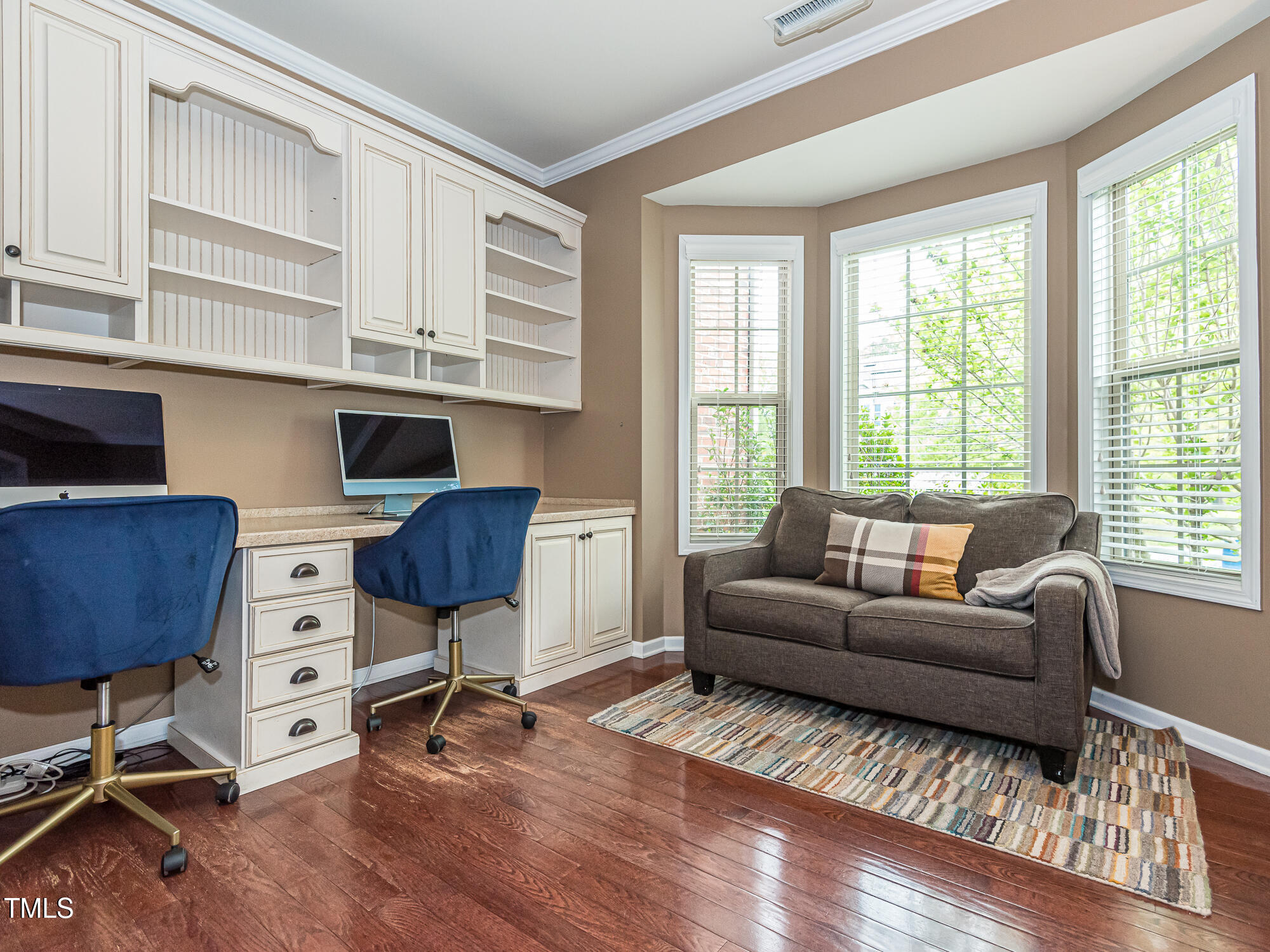 111 Gathering Place Durham, NC 27713 - Photo 18 of 44 a living room with furniture a desk and chair with wooden floor