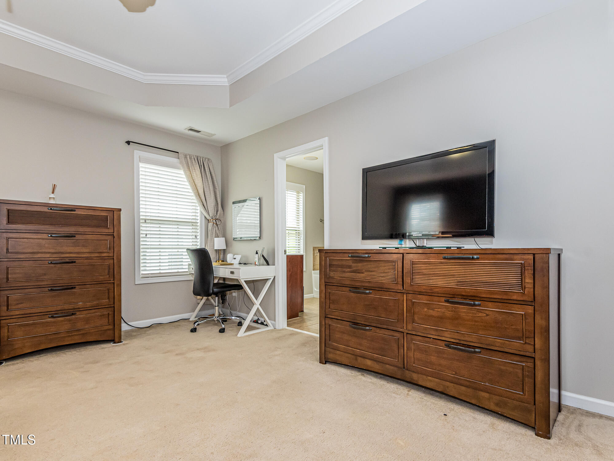 111 Gathering Place Durham, NC 27713 - Photo 23 of 44 a living room with furniture and a flat screen tv