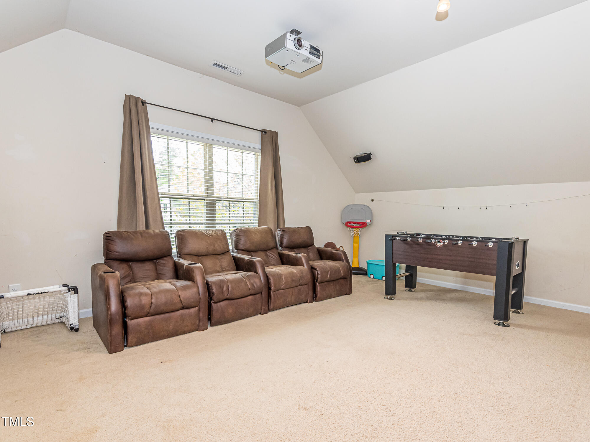111 Gathering Place Durham, NC 27713 - Photo 31 of 44 a living room with furniture and a window