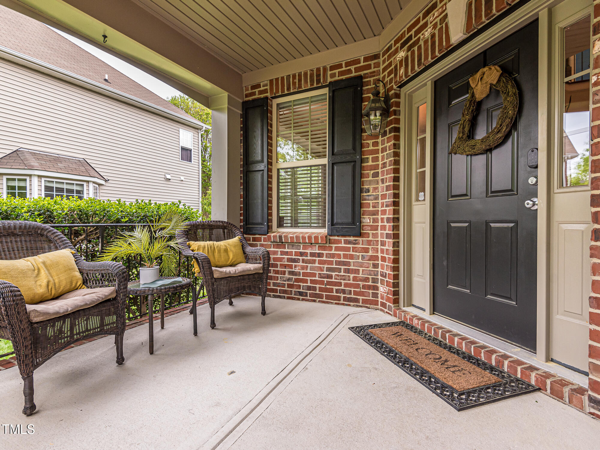 111 Gathering Place Durham, NC 27713 - Photo 4 of 44 a building outdoor space with patio furniture