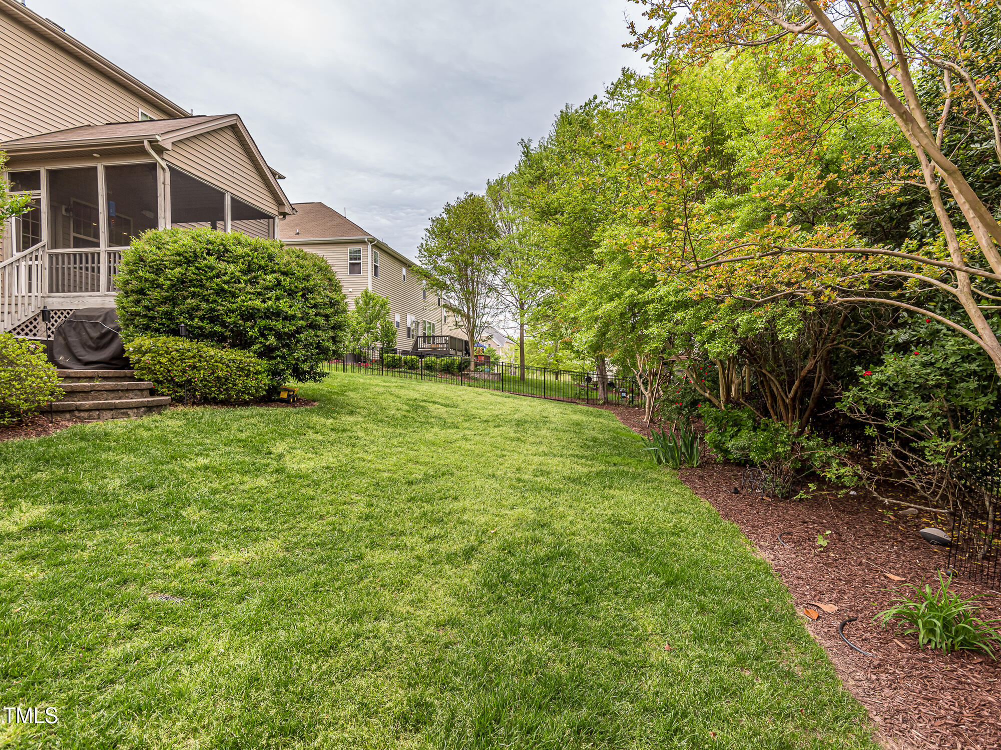 111 Gathering Place Durham, NC 27713 - Photo 44 of 44 a view of a house with a garden