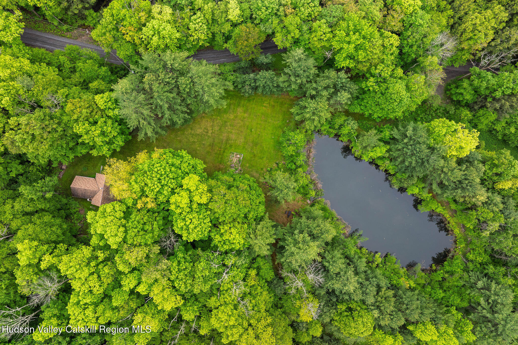 75 Upper Hollow Road Austerlitz, NY 12529 - Photo 8 of 21 a view of a garden with a lake