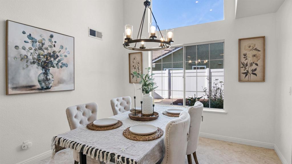 354 Lustrosos Street Oceanside, CA 92057 - Photo 14 of 75 a dining room with furniture and window