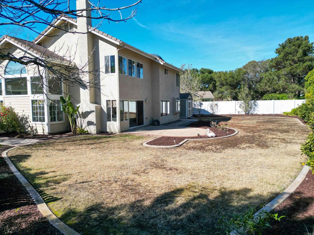 354 Lustrosos Street Oceanside, CA 92057 - Photo 52 of 75 a view of a house with snow on the side of the road