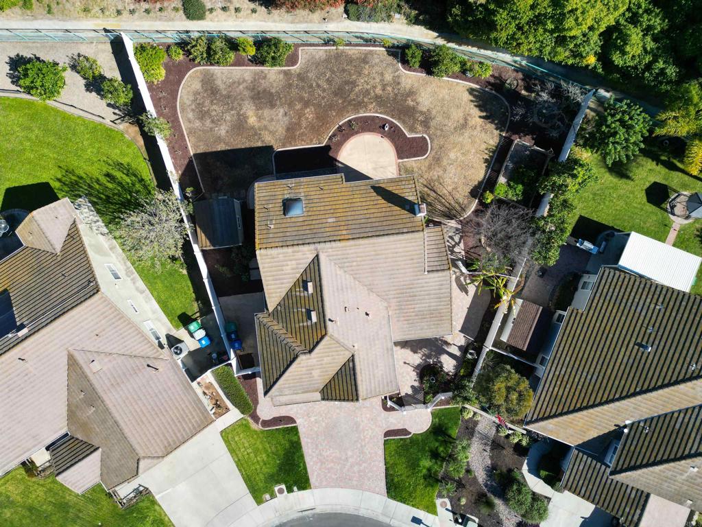 354 Lustrosos Street Oceanside, CA 92057 - Photo 54 of 75 an aerial view of a house with garden space and street view