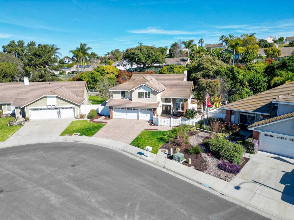 354 Lustrosos Street Oceanside, CA 92057 - Photo 56 of 75 an aerial view of a house with a garden and street view