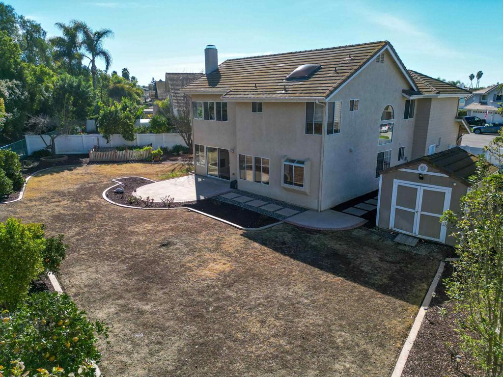 354 Lustrosos Street Oceanside, CA 92057 - Photo 58 of 75 a view of a house with a yard