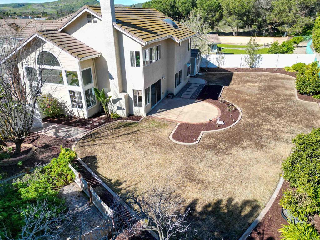 354 Lustrosos Street Oceanside, CA 92057 - Photo 61 of 75 a view of a house with backyard and sitting area