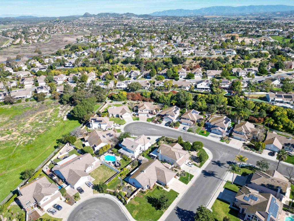 354 Lustrosos Street Oceanside, CA 92057 - Photo 72 of 75 an aerial view of residential houses with outdoor space