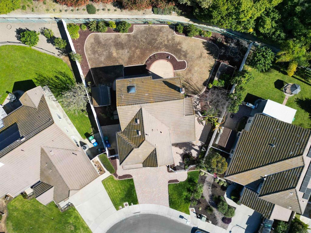 354 Lustrosos Street Oceanside, CA 92057 - Photo 75 of 75 an aerial view of a house with garden space and street view