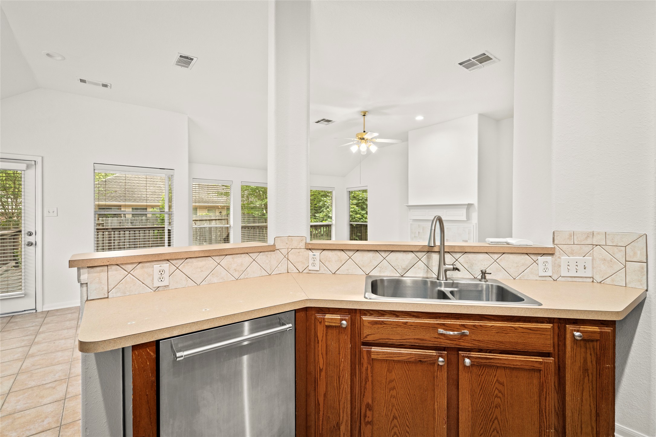 142 South Veranda Ridge Drive Spring, TX 77382 - Photo 10 of 31 The Kitchen is complimented with Stainless Steel appliances. Shown here is the Kitchen-Aid Dishwasher.