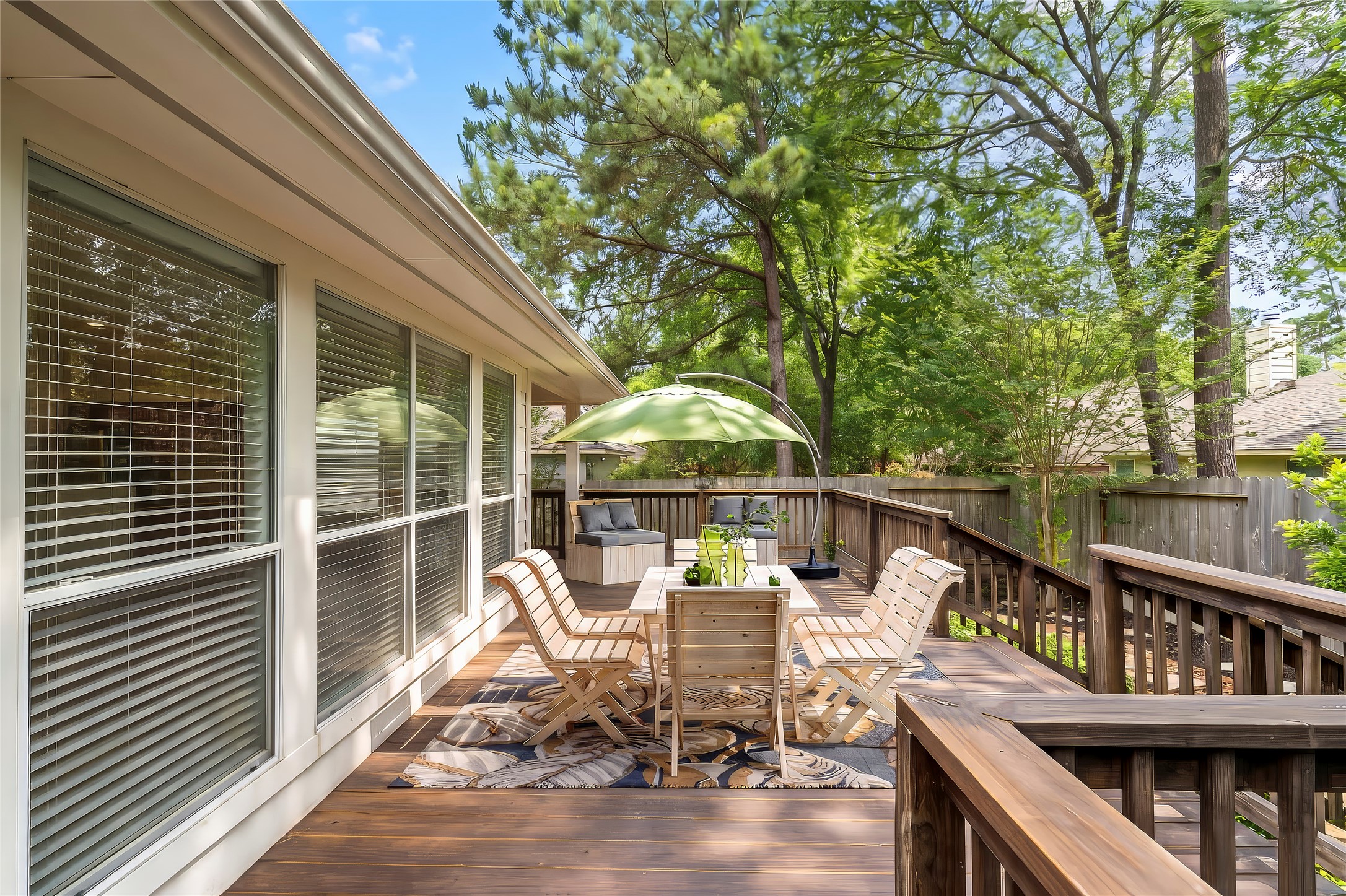 142 South Veranda Ridge Drive Spring, TX 77382 - Photo 23 of 31 An expansive deck runs the entire length of the back of the home and can be accessed from the Breakfast Room and the Primary Bedroom. This is the perfect place to begin your mornings with coffee, end your day with a cocktail or entertain family and friends. This is where memories are made. (This photo has been virtually staged.)