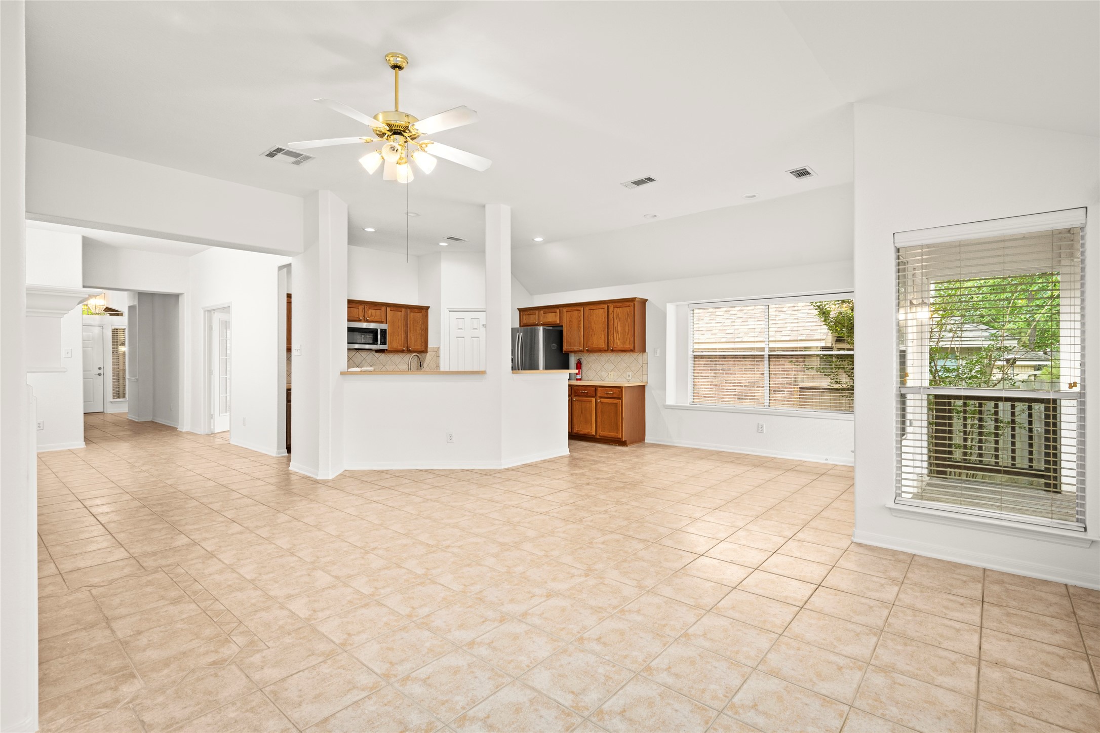 142 South Veranda Ridge Drive Spring, TX 77382 - Photo 7 of 31 The open Kitchen is the heart of the home, conveniently located between the Breakfast Room, Dining Room, Living Room and the Back Yard.