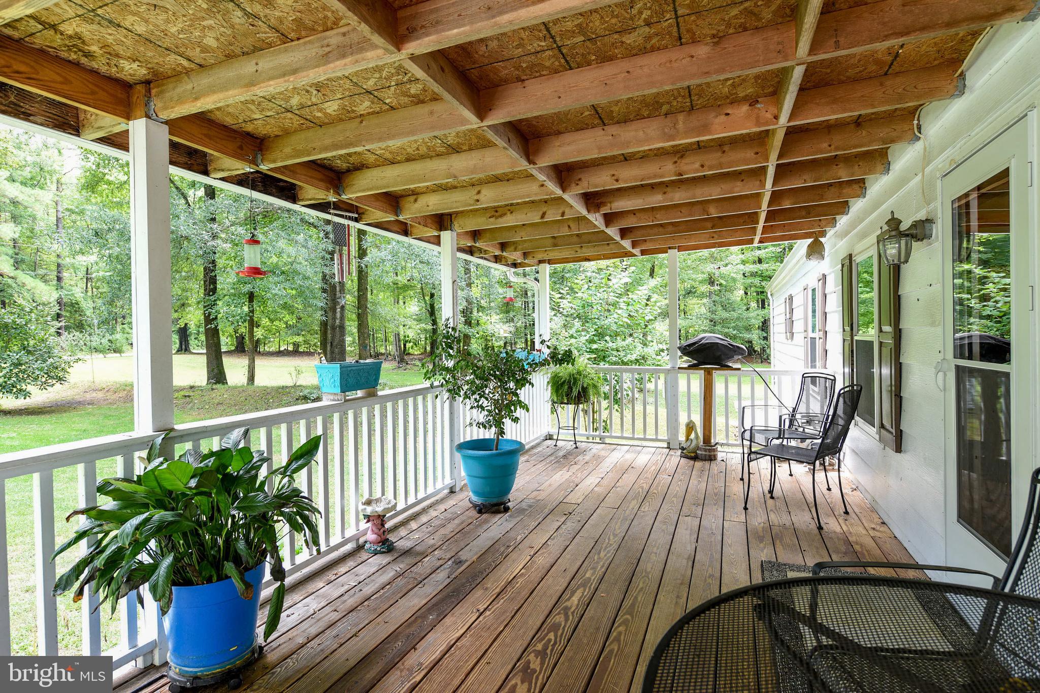 13520 South Union Church Road Ellendale, DE 19941 - Photo 23 of 36 Covered Front Deck 9' 7" x 23'5"