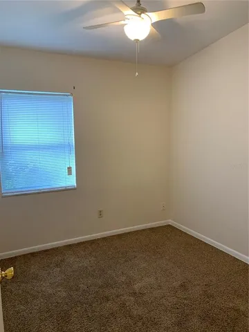 a view of a room with lots of green space