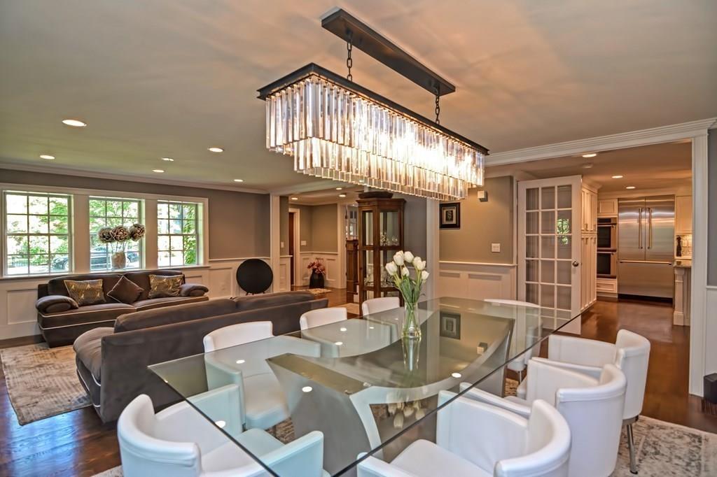 70 Arnold Road Newton, MA 02459 - Photo 15 of 39 a living room with furniture a large window and wooden floor