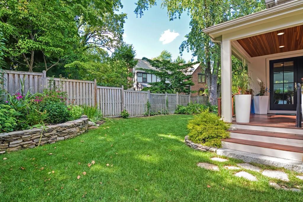 70 Arnold Road Newton, MA 02459 - Photo 34 of 39 a view of a house with a yard and plants