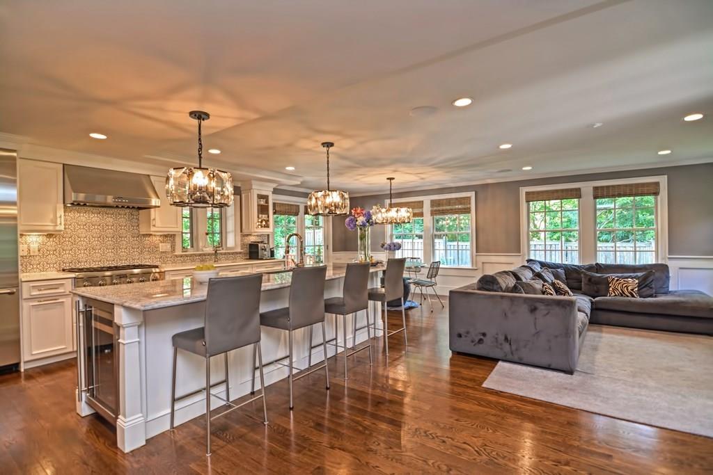 70 Arnold Road Newton, MA 02459 - Photo 5 of 39 a living room with stainless steel appliances kitchen island granite countertop furniture and a large window