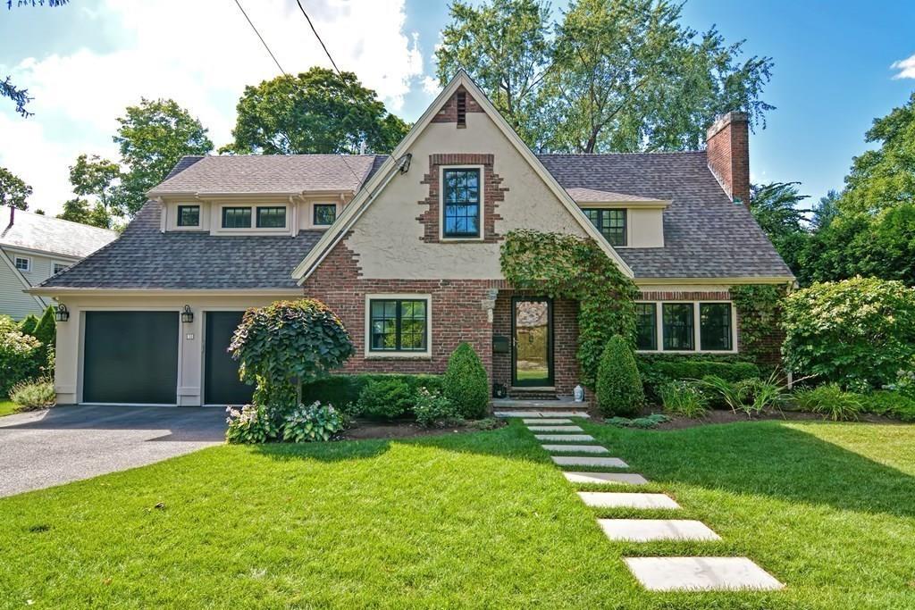 70 Arnold Road Newton, MA 02459 - Photo 6 of 39 a front view of a house with a yard