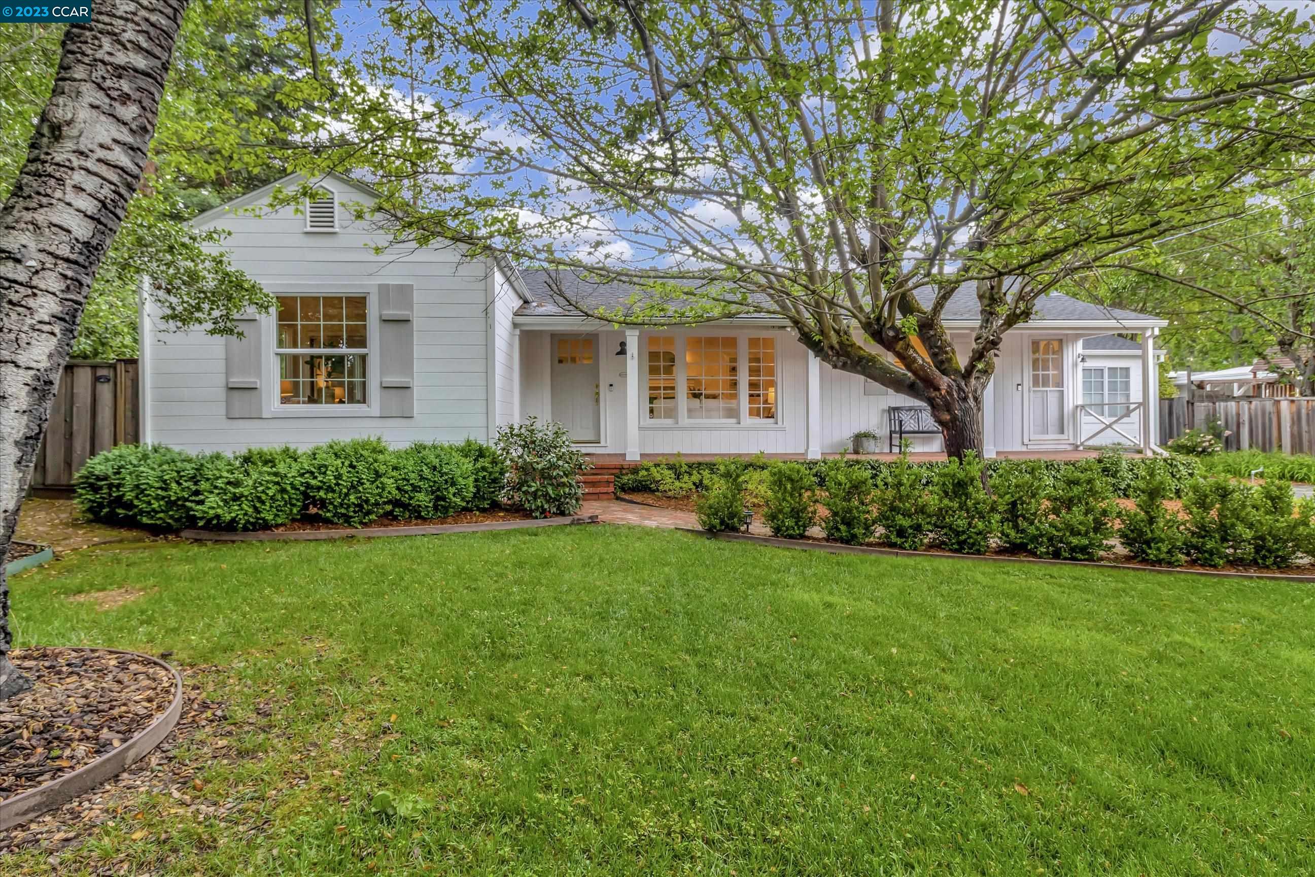 161 Flora Avenue Walnut Creek, CA 94595 - Photo 1 of 1 a front view of a house with a garden