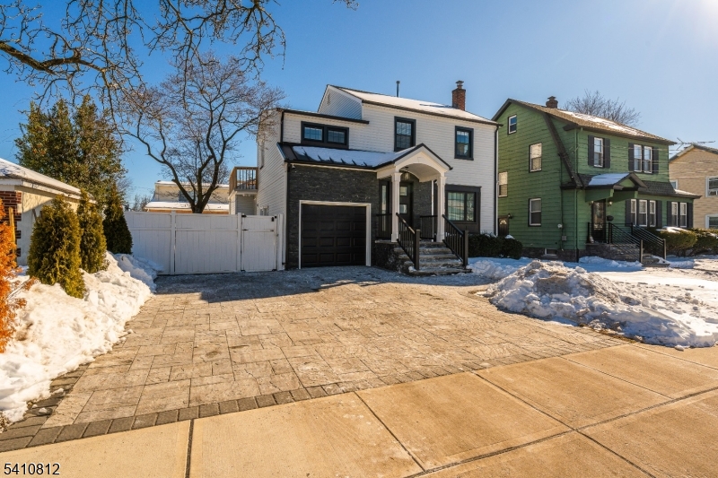 985 Arnet Avenue Union, NJ 07083 - Photo 23 of 26 a front view of a house with a yard