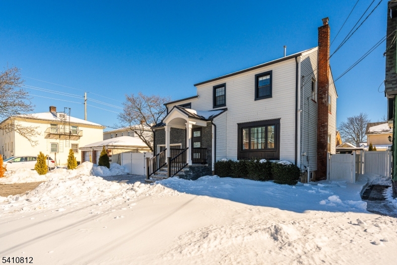 985 Arnet Avenue Union, NJ 07083 - Photo 25 of 26 a view of a house with snow on the road