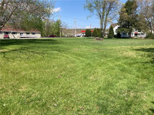a fire hydrant in the middle of a field