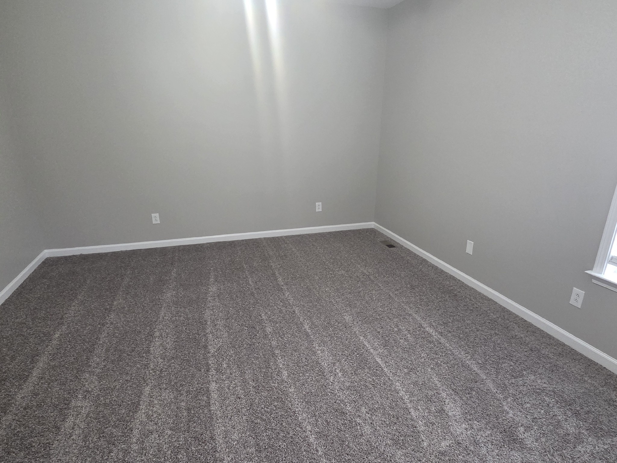 617 Rambush Drive Murfreesboro, TN 37128 - Photo 12 of 32 a view of an empty room with wooden floor