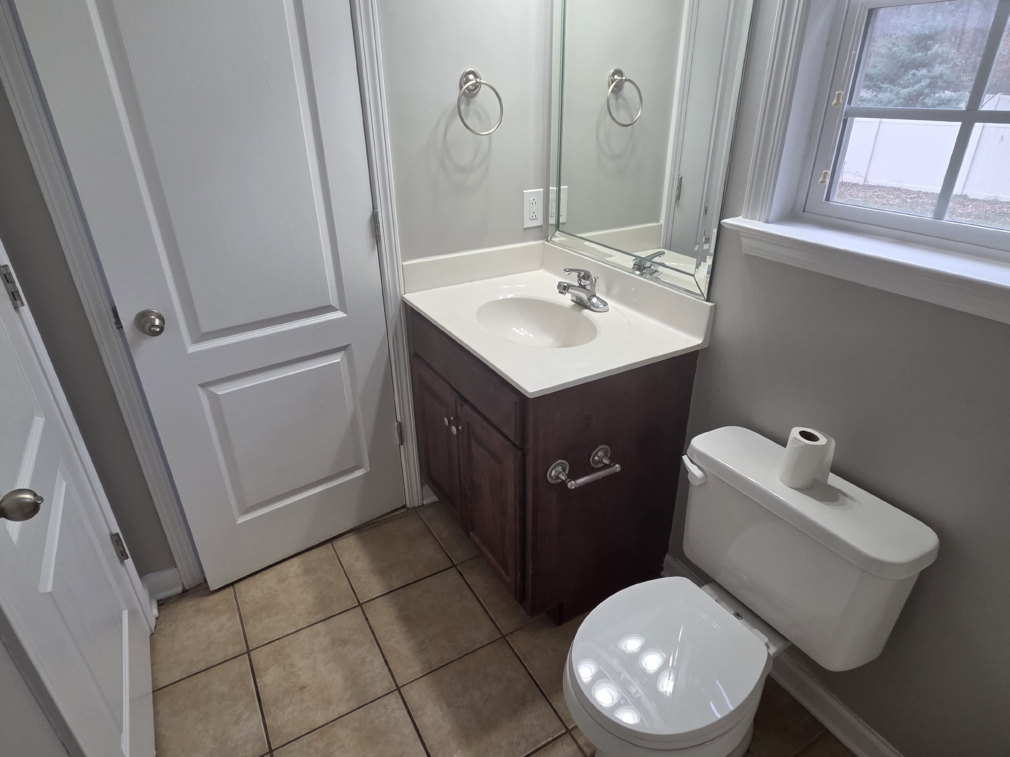 617 Rambush Drive Murfreesboro, TN 37128 - Photo 14 of 32 a bathroom with a sink vanity mirror and toilet