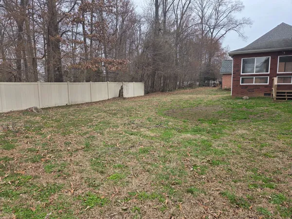 a view of a backyard with a garden