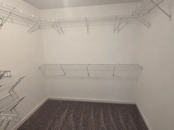 a view of a room with racks on the wall
