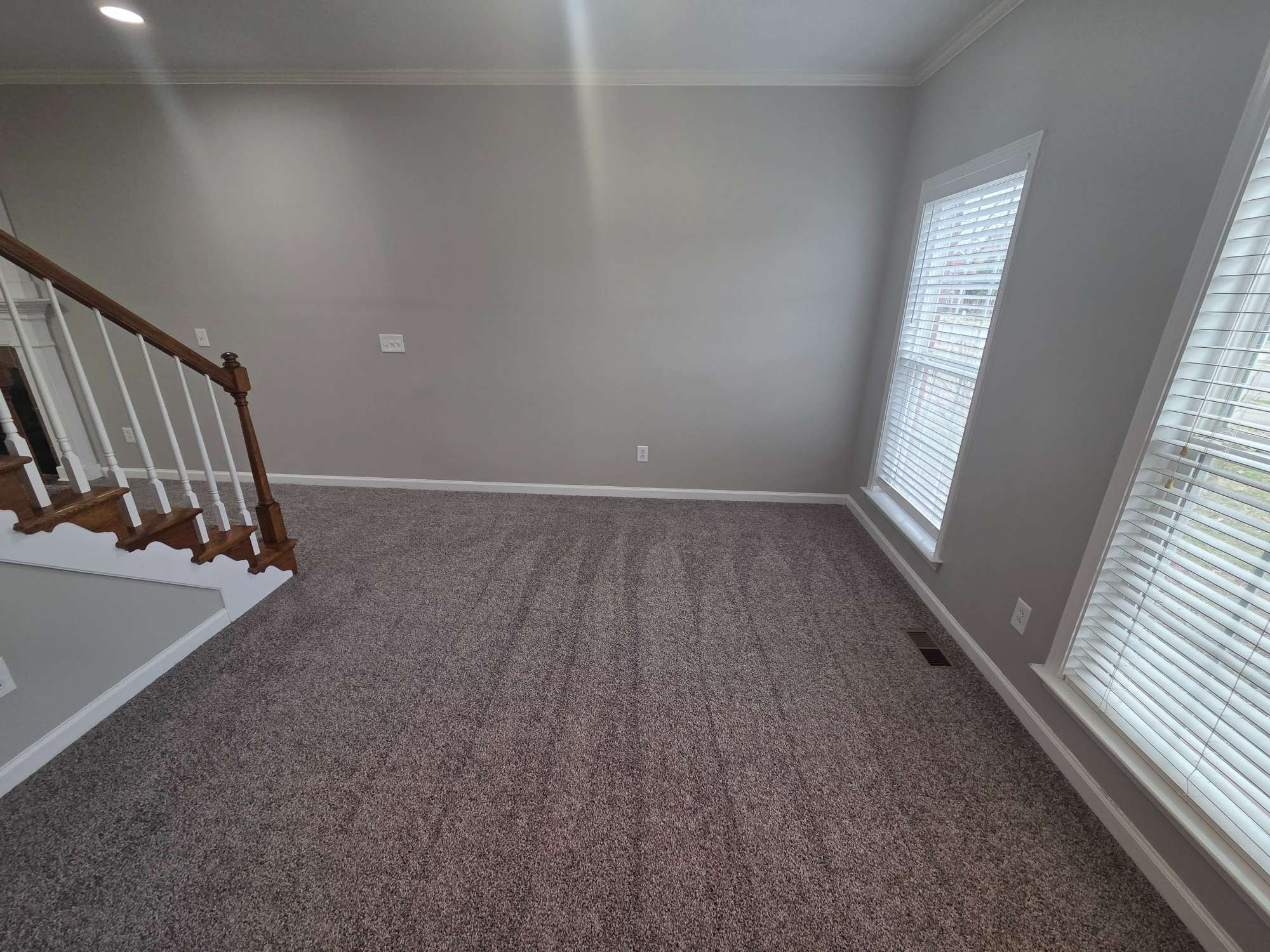 617 Rambush Drive Murfreesboro, TN 37128 - Photo 5 of 32 an entryway in a hall with wooden floor and stairs