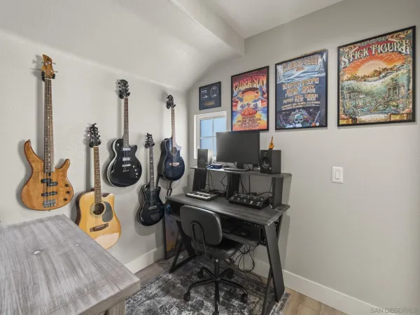 a bedroom with a bed and a fireplace