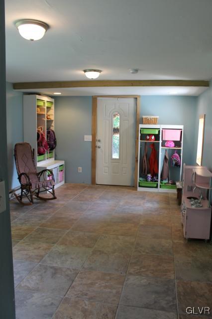 552 Interchange Road Kunkletown, PA 18058 - Photo 2 of 20 a view of a livingroom with furniture and toys