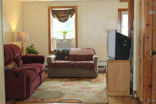 552 Interchange Road Kunkletown, PA 18058 - Photo 6 of 20 a living room with furniture and a window