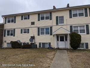 328 B Sawmill Road, Unit 136 Brick, NJ 08724 - Photo 1 of 1 a front view of a house with a yard