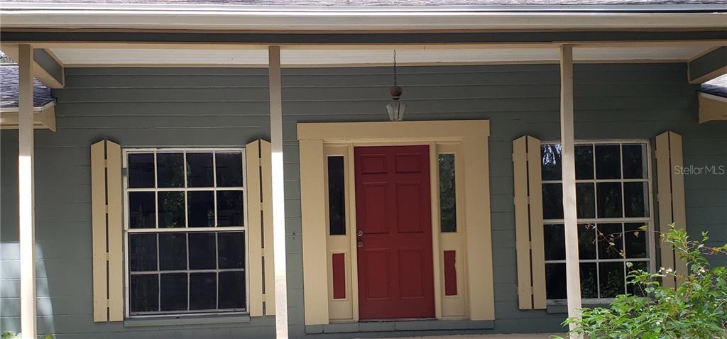 22840 Northwest 75th Avenue Road Micanopy, FL 32667 - Photo 1 of 1 a view of front door
