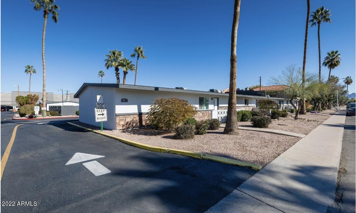 2020 West Hayward Avenue, Unit 10 Phoenix, AZ 85021 - Photo 8 of 13 a front view of a house with yard