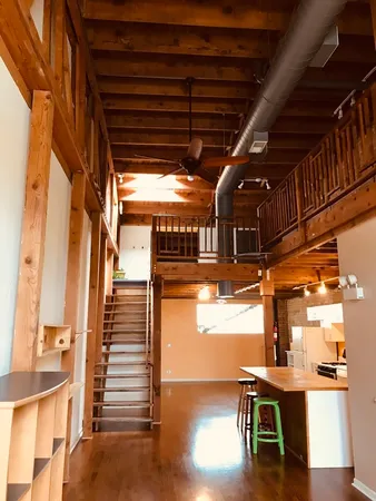 a view of entryway with wooden floor