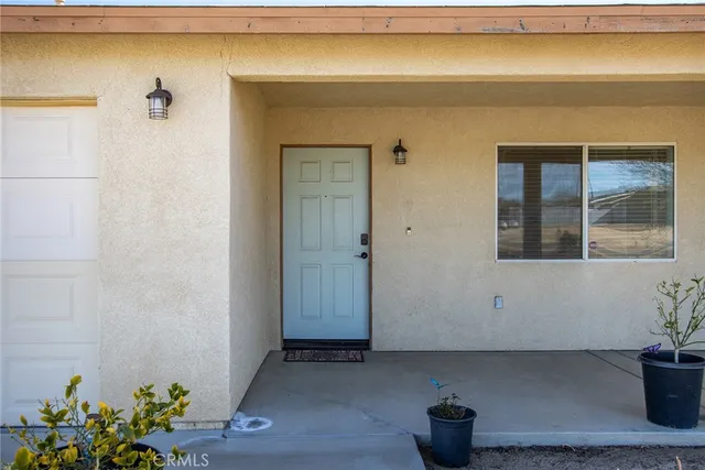 a view of swimming pool from a balcony