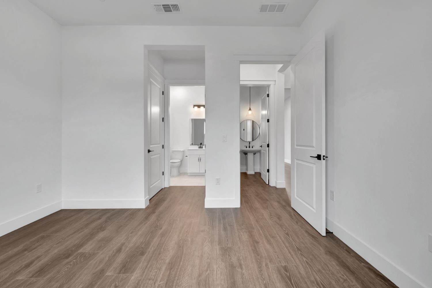 4327 Hooded Crow Way Rancho Cordova, CA 95742 - Photo 33 of 58 a view of a bathroom with wooden floor