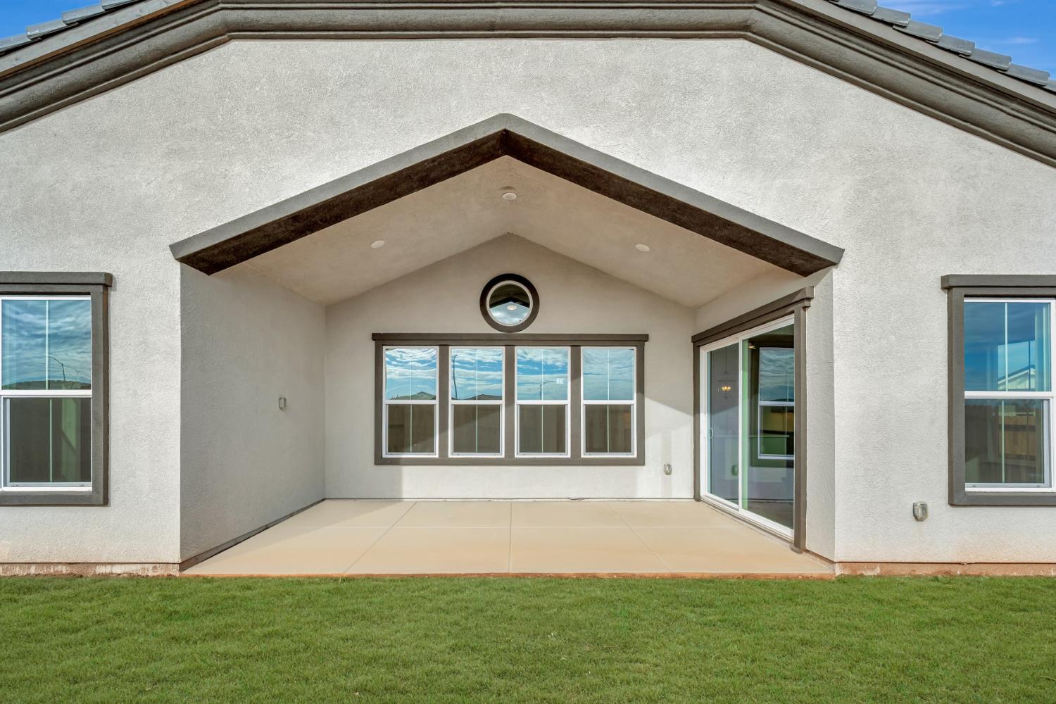 4327 Hooded Crow Way Rancho Cordova, CA 95742 - Photo 56 of 58 a front view of a house with a yard