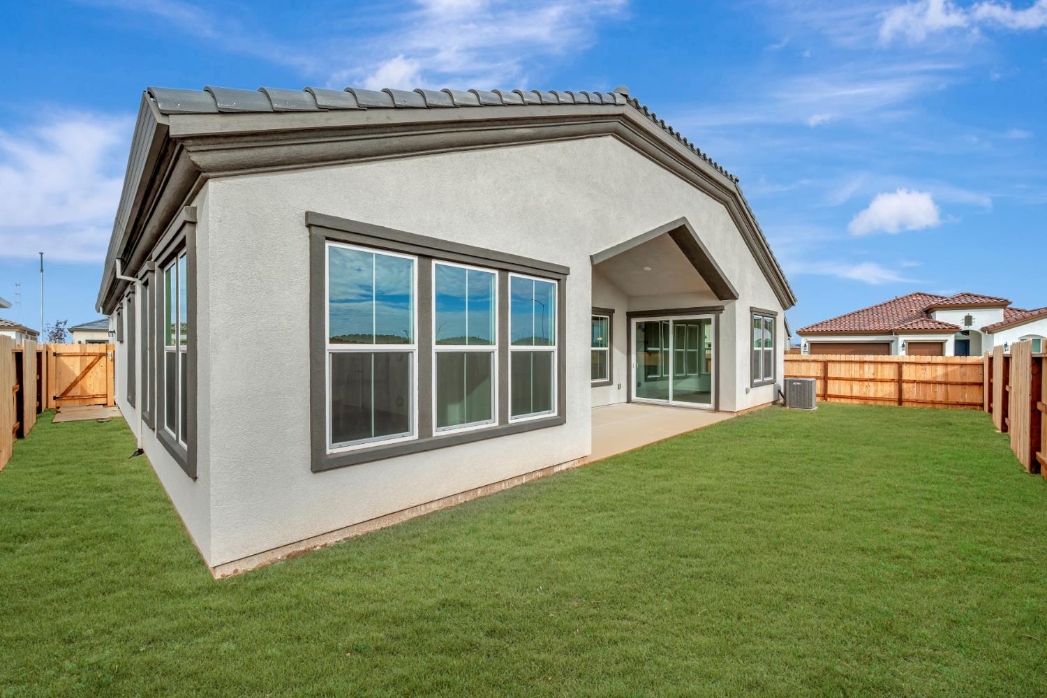 4327 Hooded Crow Way Rancho Cordova, CA 95742 - Photo 57 of 58 a view of front of house with yard