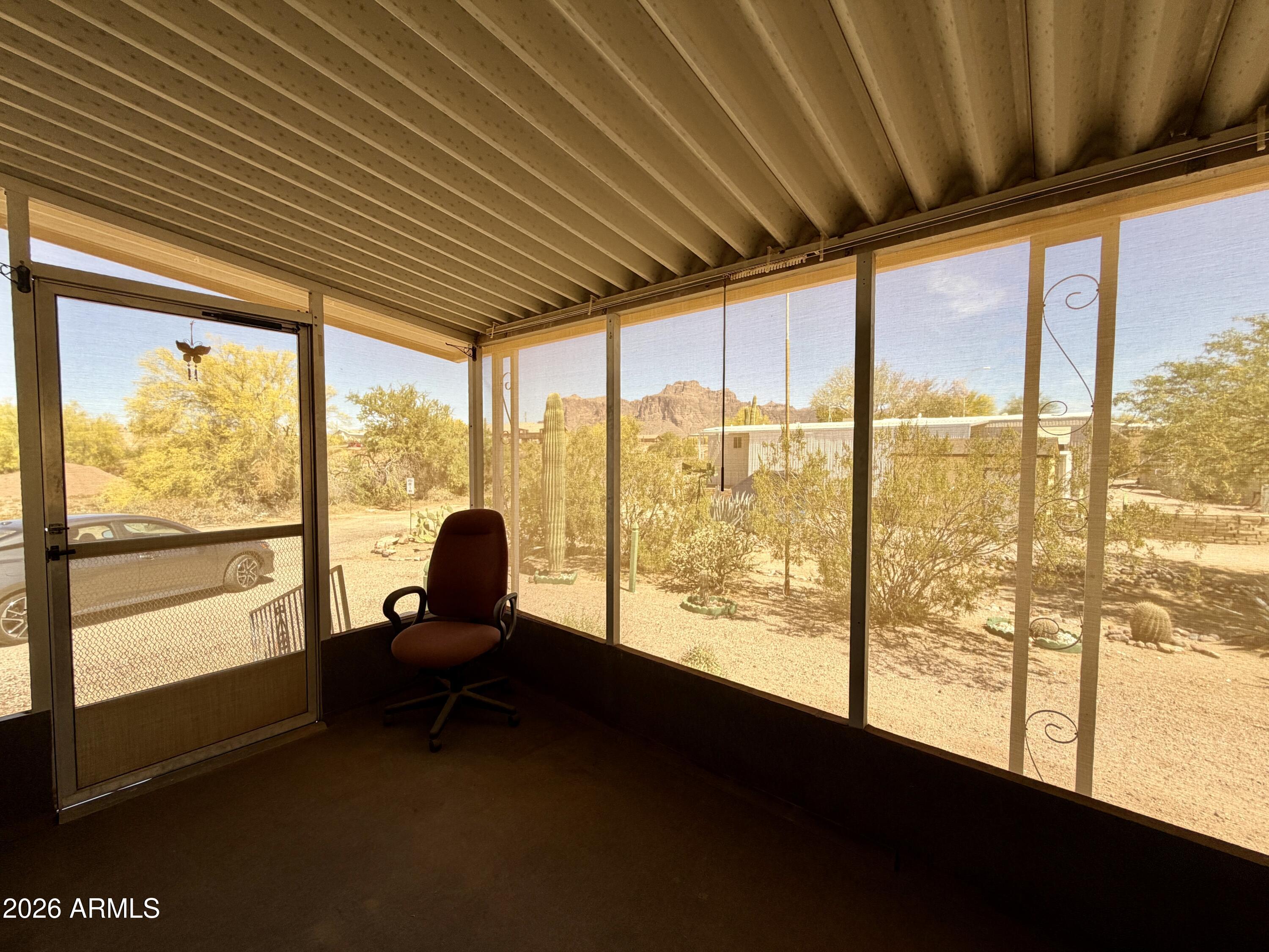 939 North Acacia Road, Unit 9 Apache Junction, AZ 85119 - Photo 20 of 36 Screened in Sun Room